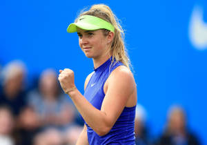 Elina Svitolina Wearing Blue And Green Wallpaper