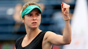 Elina Svitolina Wearing Green Sun Visor Wallpaper