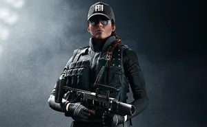 Elite Ash Operator In Action In Rainbow Six Siege Wallpaper