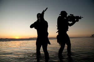 Elite Navy Seals In Training For Mission Wallpaper