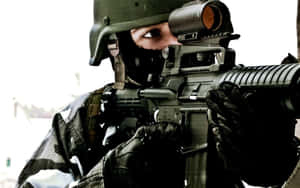 Elite Special Forces Operators Ready For Action Wallpaper