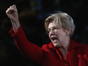 Elizabeth Warren Raising Fist During Rally Wallpaper