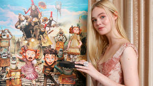 Elle Fanning Holding Winnie Wallpaper