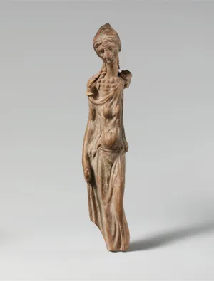 Emaciated Woman Terracotta Statue In A Museum Wallpaper
