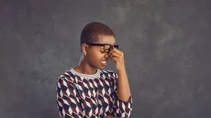 Embarrassed Woman Laughing Wallpaper