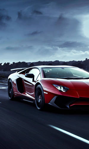 Embrace The Luxurious Lifestyle With This 4k Lamborghini Iphone Wallpaper