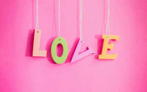 Embrace The Romance With Pink Love Heart Wallpaper Wallpaper