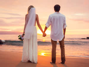 Embracing Eternity Together - A Love Story At The Beach Wallpaper