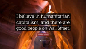 Embracing Humanity: A Quote On Humanitarian Capitalism Wallpaper