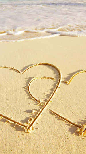 Embracing Love By The Beach Wallpaper