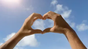 Embracing Love In A Magical Sunset Wallpaper