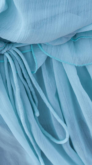 Embracing Nature With Light Blue Aesthetic Flowy Dress Wallpaper