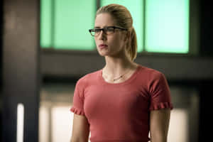 Emily Bett Rickardsin Red Topand Glasses Wallpaper