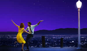 Emily Blunt And Ryan Gosling Seize The Magic Of La La Land In This Spectacular 4k Image Wallpaper