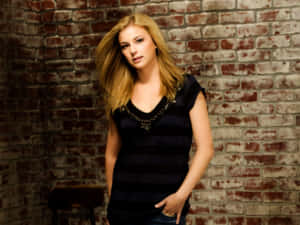 Emily Vancamp Casual Brick Backdrop Wallpaper