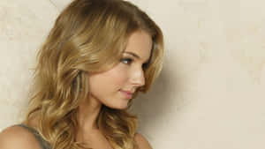 Emily Vancamp Elegant Side Glance Wallpaper