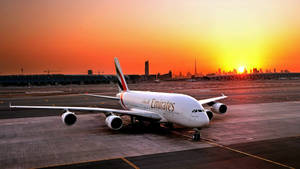 Emirates Airplane At The Airport Wallpaper