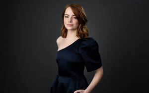 Emma Stone Posing In A Puffed Sleeve Dress. Wallpaper