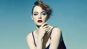 Emma Stone Radiating Confidence And Glamour Wallpaper