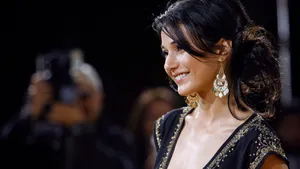 Emmanuelle Chriqui Posing For A Photoshoot Wallpaper