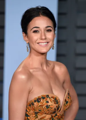 Emmanuelle Chriqui Striking A Pose In A Fashionable Outfit Wallpaper