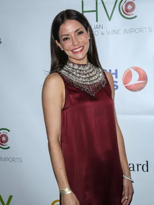 Emmanuelle Vaugier Posing Elegantly In A Photoshoot Wallpaper