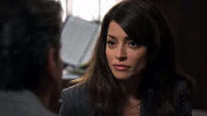 Emmanuelle Vaugier Posing Gracefully In An Outdoor Setting Wallpaper