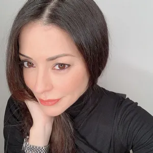 Emmanuelle Vaugier Radiating Elegance In A Black Dress Wallpaper