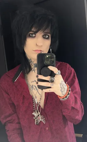 Emo Inspired Selfiewith Tattoosand Piercings Wallpaper