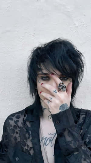 Emo Styled Individual Covering Facewith Hand.jpg Wallpaper