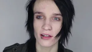 Emo Styled Individualwith Piercings Wallpaper