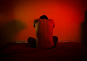 Emotional Distress Red Backdrop Wallpaper