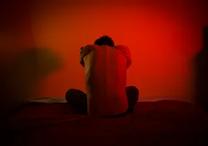Emotional Distress Red Backdrop Wallpaper