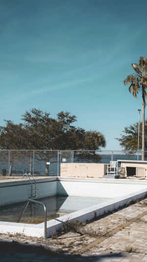 Empty Abandoned Pool Scene Wallpaper