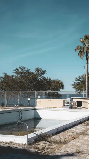 Empty Abandoned Pool Scene Wallpaper