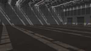 Empty_ Industrial_ Hall_with_ Shadows.jpg Wallpaper