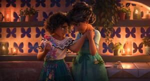 Encanto - Mirabel And Her Mother Julieta In A Profound Moment Wallpaper