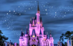 Enchanted_ Castle_ Under_ Twinkling_ Stars Wallpaper