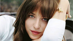 Enchanting Close-up Shot Of Dakota Johnson Wallpaper