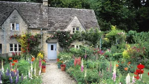 Enchanting Cottage Garden In Full Bloom Wallpaper