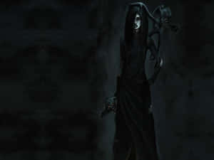 Enchanting Dark Witch Under A Full Moon Wallpaper