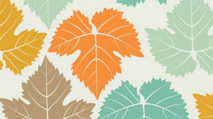 Enchanting Display Of Autumn - Orange, Brown, And Blue Maple Leaves Aesthetic Wallpaper