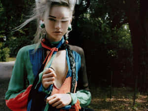 Enchanting Gemma Ward Poses Effortlessly During A Photoshoot Wallpaper