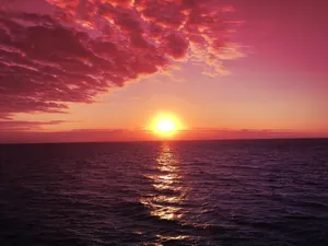 Enchanting Pink Sky At Sunset Wallpaper