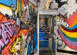 Enchanting Rainbow Over Tranquil Ocean Wallpaper