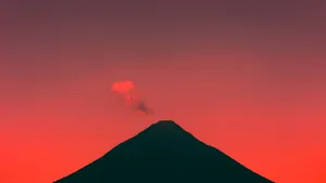 Enchanting Red Sunset Over The Ocean Wallpaper