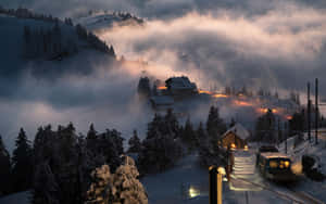 Enchanting Snow-covered Village Wallpaper