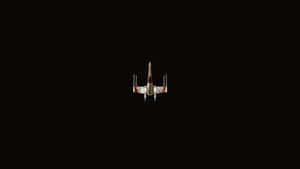 Encountering An X-wing Fighter Mid-battle Wallpaper