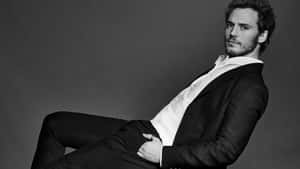 Engaging Portrait Of Sam Claflin Wallpaper