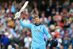 England Cricketer Joe Root In Action Wallpaper